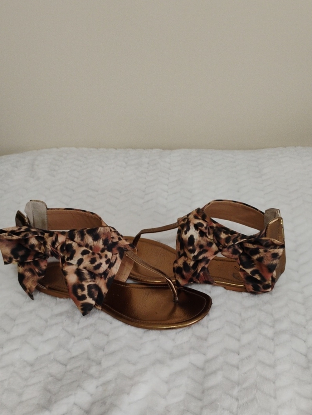 Colin Stuart Leopard Bow T-Strap Sandals in Brown and Gold